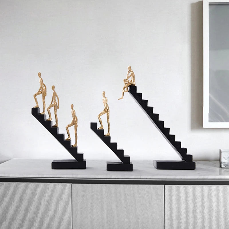 Statue Of Human Figures On Ladder Modern Figure