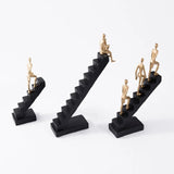 Statue Of Human Figures On Ladder Modern Figure